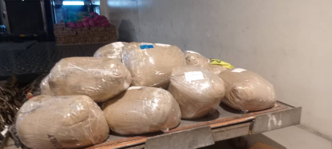 Palletized coffee packages prepared for dispatch